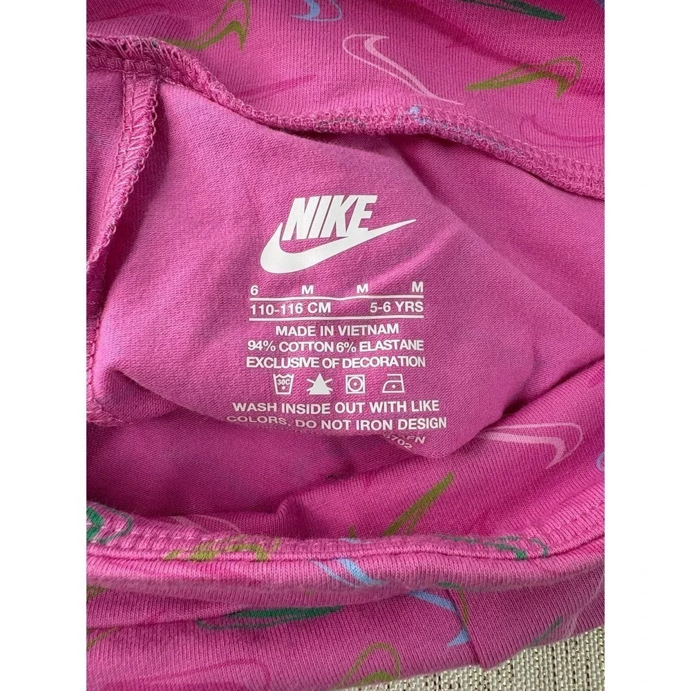 Three pairs of pink Nike biker shorts, size 6X and 6